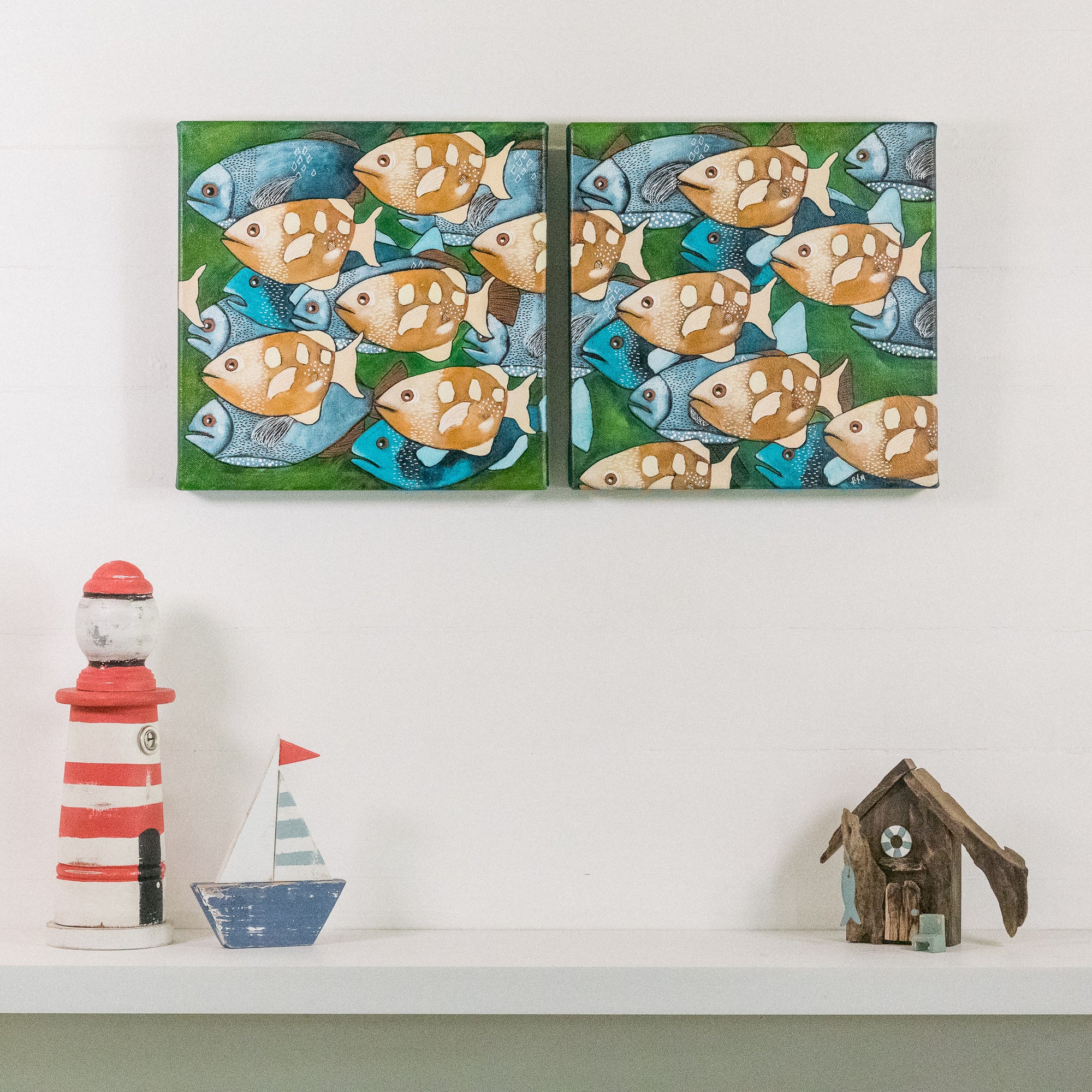 Hurry Up, We're Late, is an original artwork by Rachel Ireland Meyers. This artwork is a diptych (2 separate canvases) with a group of archerfish in blue hues, warm caramel, set against a green background. Available online, www.rimmad.com