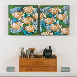 Hurry Up, We're Late, is an original artwork by Rachel Ireland Meyers. This artwork is a diptych (2 separate canvases) with a group of archerfish in blue hues, warm caramel, set against a green background. Available online, www.rimmad.com 